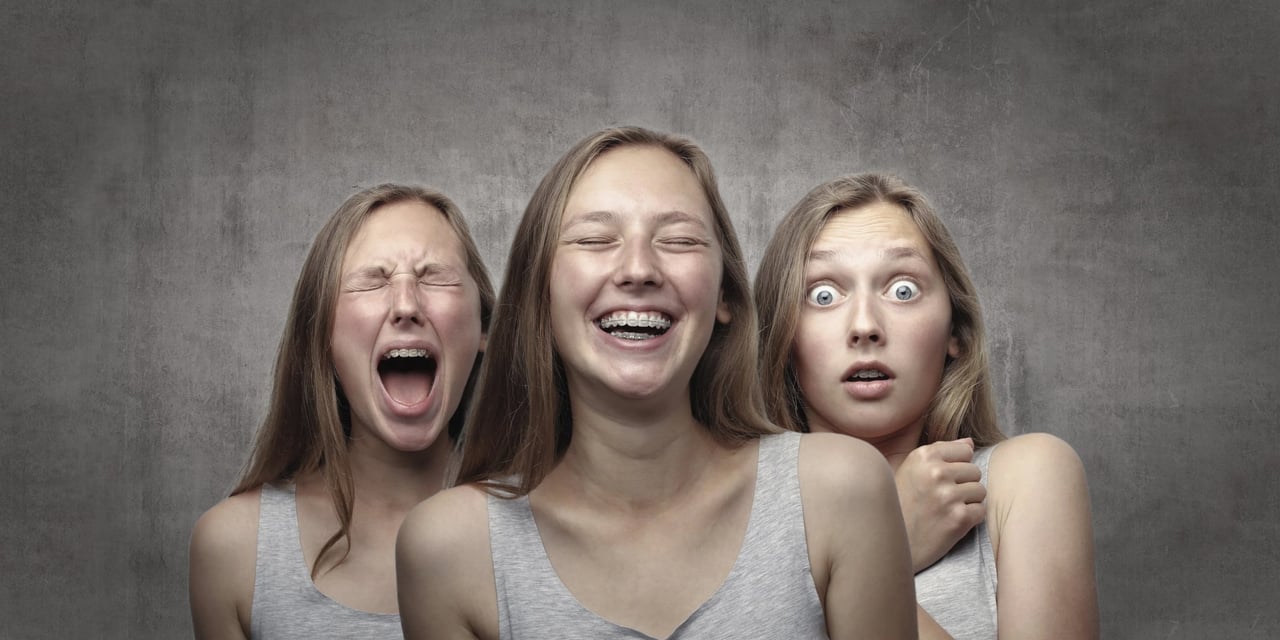 5 cartoon expressions on their own colored squares. Made by Inflow.