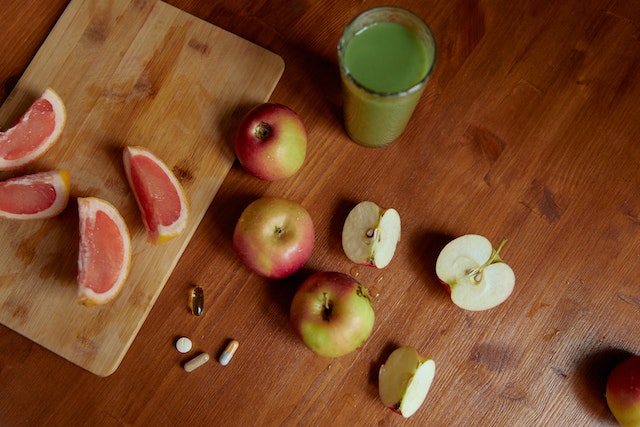 fruit and a protein shake on the table next to adhd medication